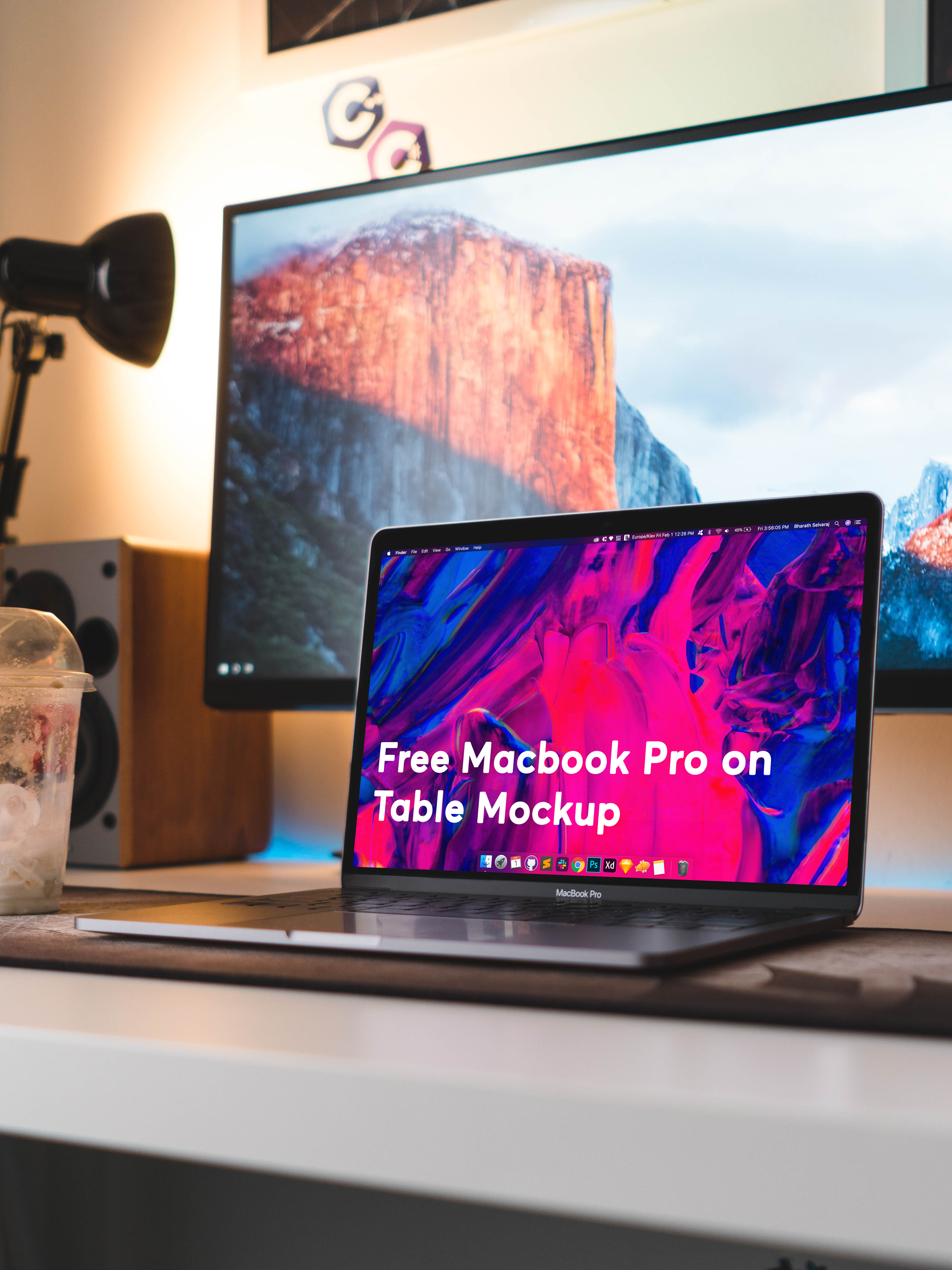 free-macbook-pro-on-table-mockup