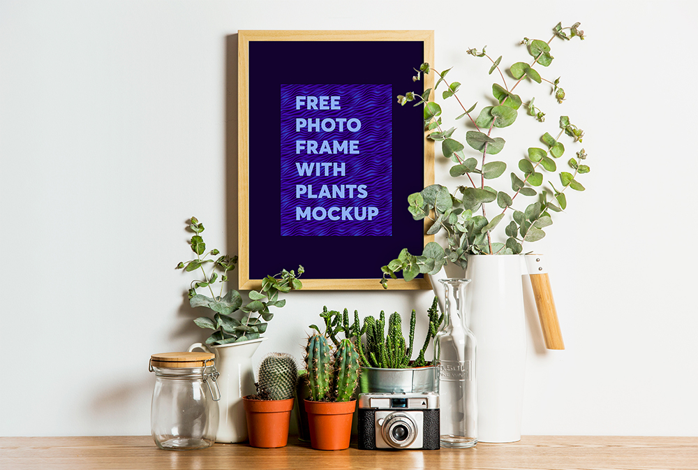 free-photo-frame-with-plants-mockup
